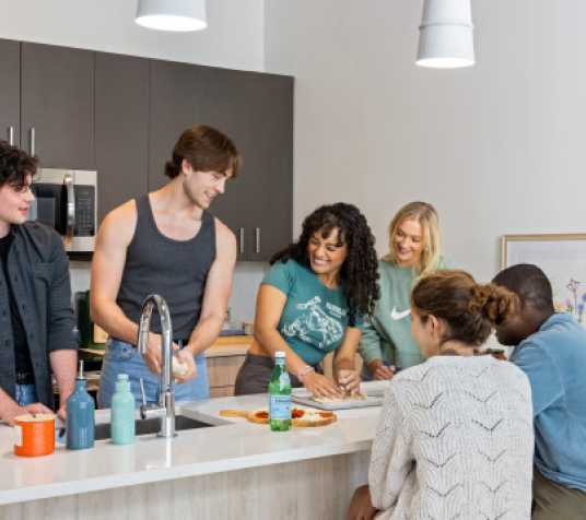 Friends cooking together