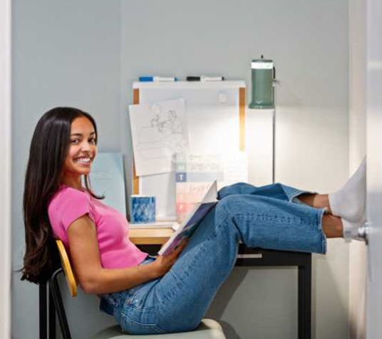 A woman studying at a desk